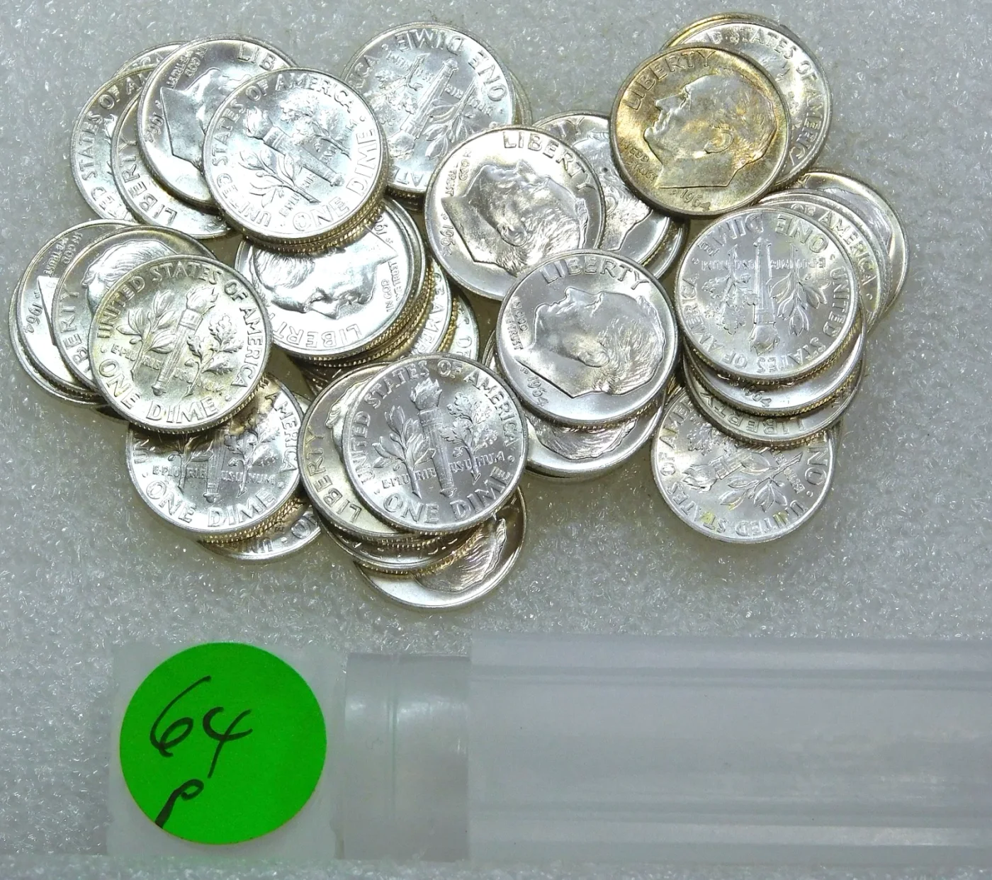 1964 Roosevelt silver dimes, an original uncirculated roll